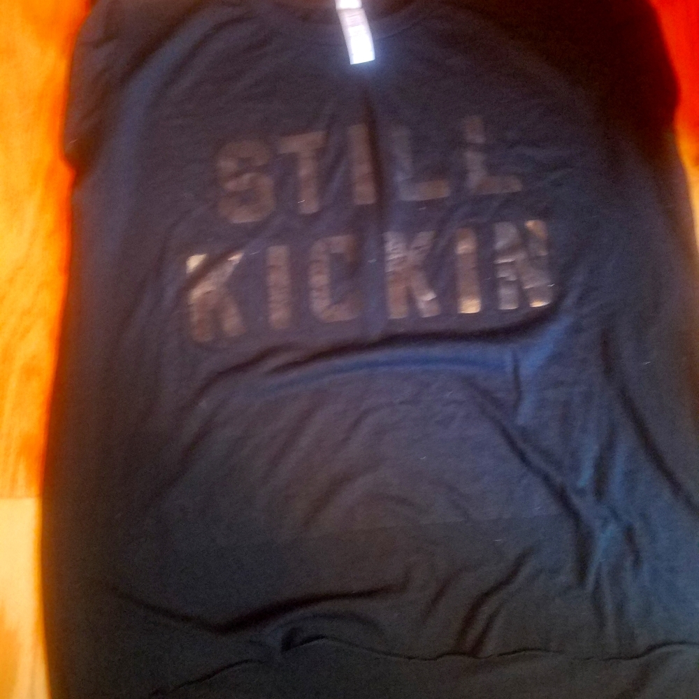 Still Kickin sleeveless tee